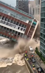 HT16. Flooding causes complete collapse of riverside buildings!