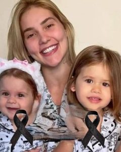 HT17. Young woman puts both daughters inside the fir…