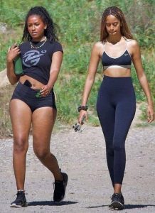 HT17. Malia and Sasha Obama party with rapper Drake, former first daughters scantily clad