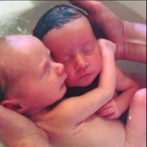 HT15. Newborn twins don’t realize they’ve been born, refuse to stop cuddling like they did in the womb