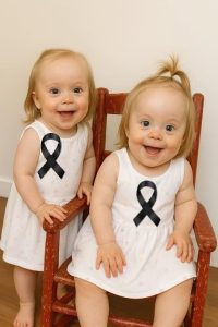 HT17. Young woman puts both babies inside the fir… See more