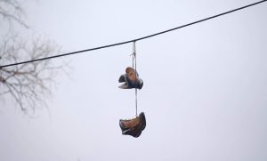HT4. The Meaning Behind Shoes Strung Up On A Power Line