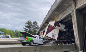 HT16. TOTAL CHAOS AS MASSIVE TRUCK SLAMS INTO OVERPASS SHATTERING MORNING COMMUTE