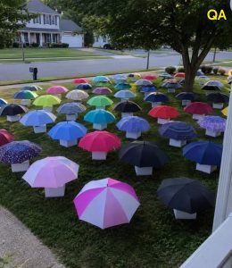 HT4. My Son Gave His Umbrella to a Pregnant Stranger in the Rain – The Next Morning, 47 Umbrellas Appeared on Our Lawn, Each With a Numbered Box That Made My Heart Stop