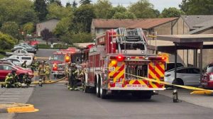 HT13. Apartment explosion caught on video as firefighters escape in Washington state