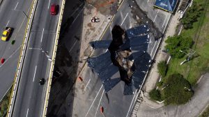 HT9. Massive Sinkhole Swallows Part of Major Road, Leaving Drivers Stunned
