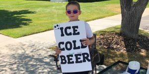 HT5. Police are called on boy selling ‘Ice Cold Beer’ but his clever sign has them laughing