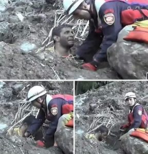 HT9. HAUNTING SCENE: Man Holds His Children Tight, Then Signals Rescuers… To Bury Them All