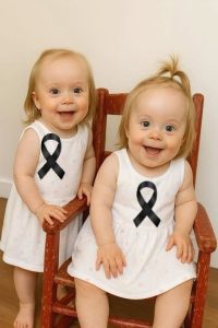 HT9. Young woman puts both babies inside the fir… See more