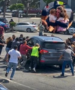 HT5. A mother was being dragged across a parking lot by an SUV while her two babies were still trapped inside.