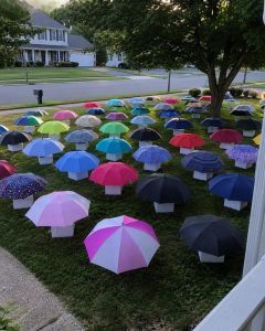 HT5. My Son Gave His Umbrella to a Pregnant Stranger in the Rain – The Next Morning, 47 Umbrellas Appeared on Our Lawn, Each With a Numbered Box That Made My Heart Stop